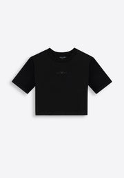 Black short-sleeve crop top on plain background, East Vibe
